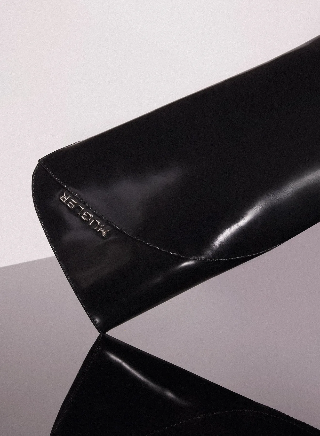black shiny leather santiag boots